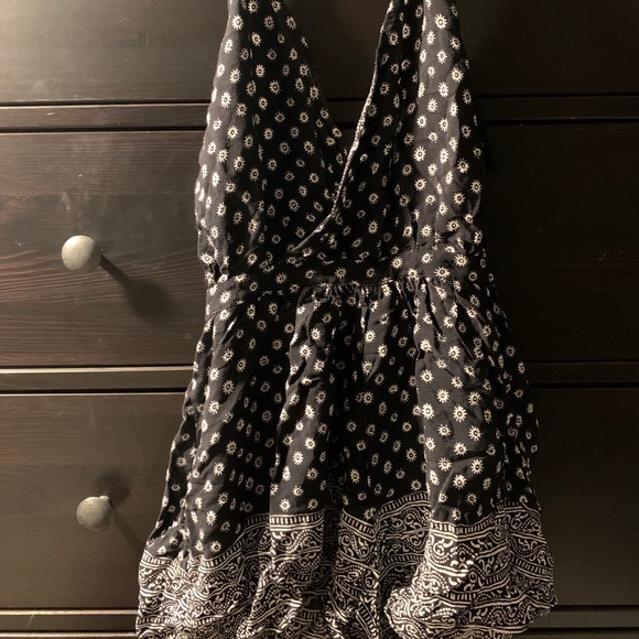 Olivaceous Black and White Halter Floral Patterned Romper - Picture 2 of 9